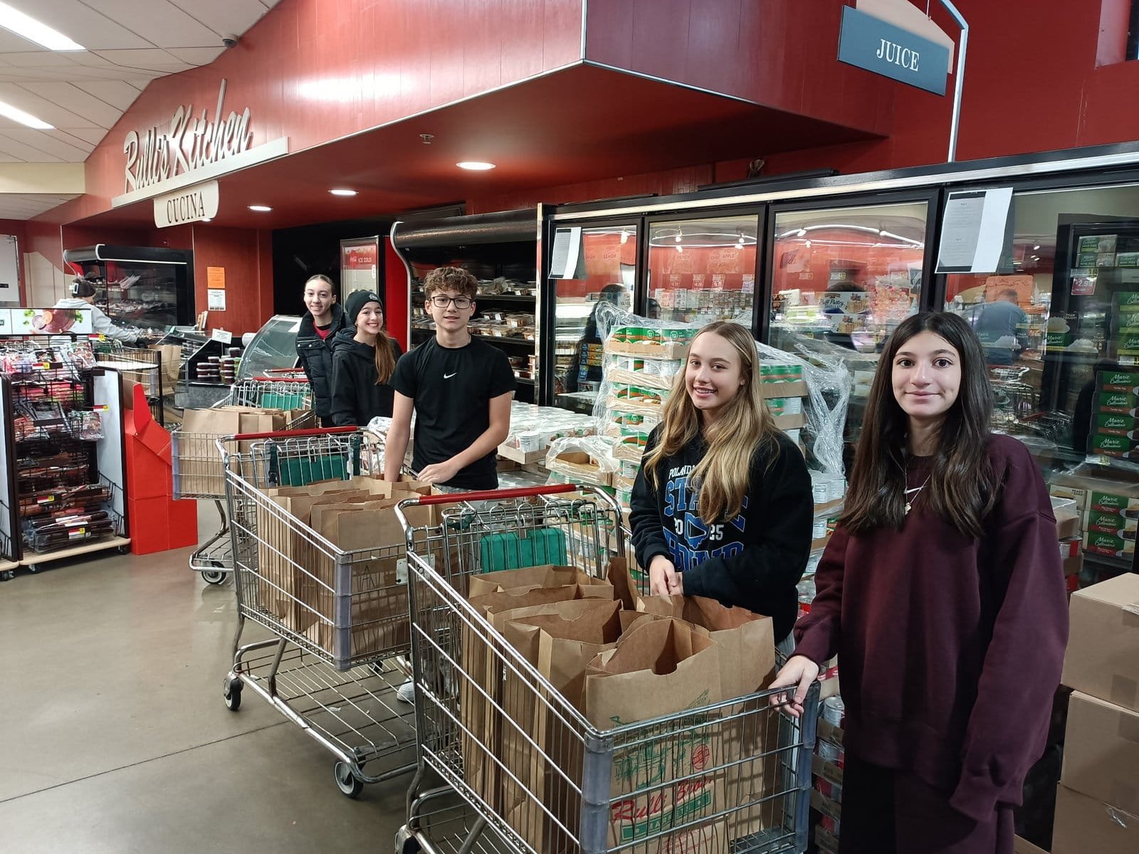 Boo Squad Fund Serves 500 Families for Thanksgiving at Rulli Brothers